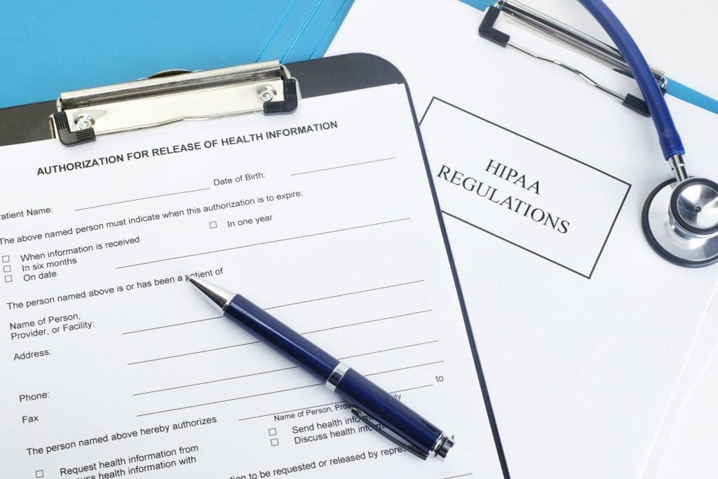 Patient release of information form with HIPAA regulations documents